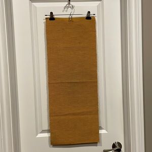 Mustard colour table runner.